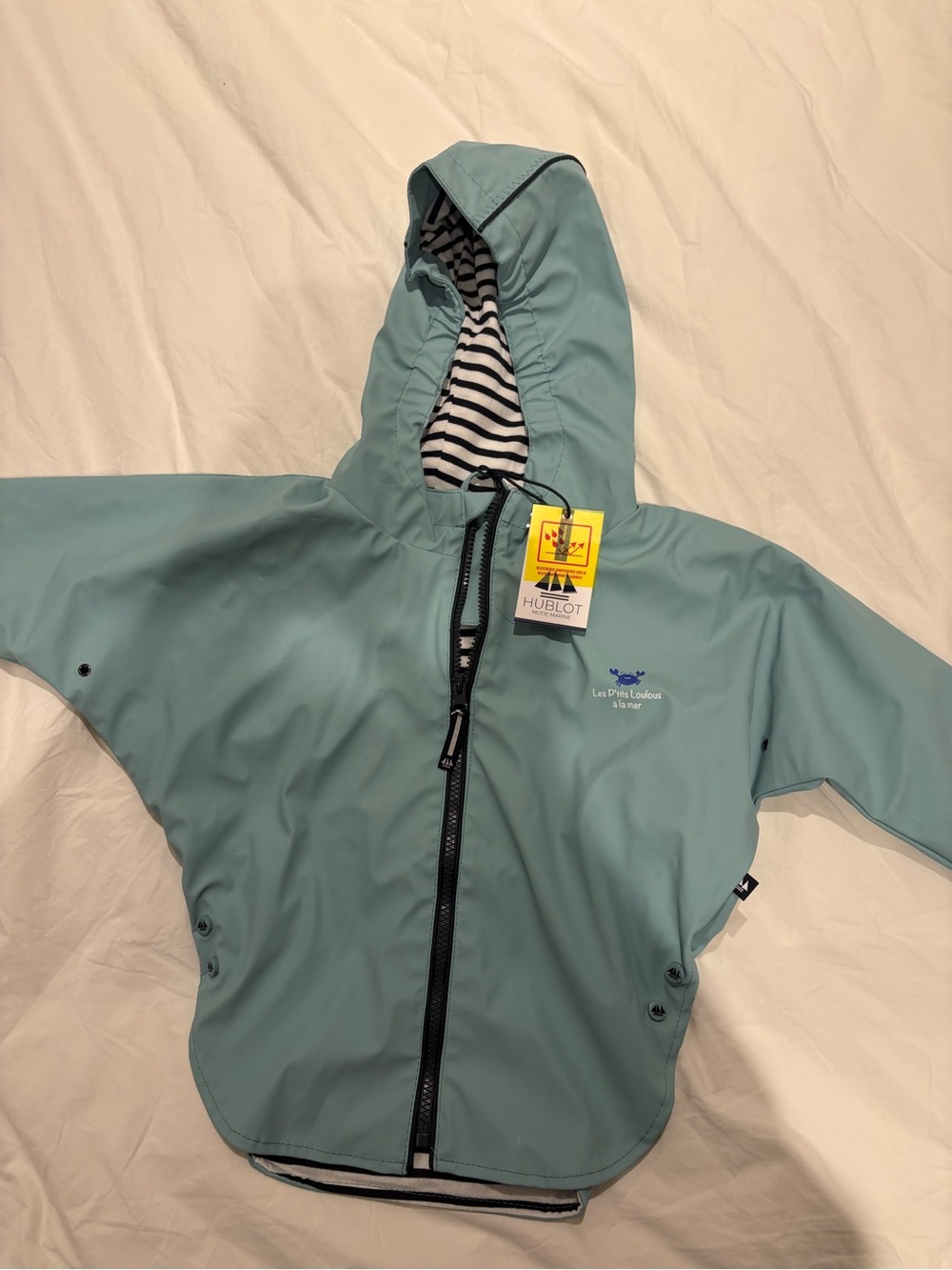 New with tag raincoat - 2yo
